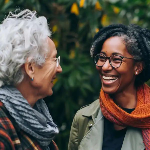 two women happily talking